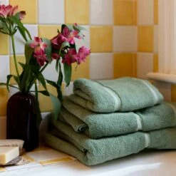 Meadow Green Hand Towel 13 Meadow Green Hand Towel -Bed Linings Sales Shop Piglet in Bed Cotton Towels Meadow Green Lifestyle 1300x1300 11