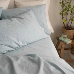 Sky Blue Seersucker Cotton Pillowcases (Pair) -Bed Linings Sales Shop Piglet in Bed Seersucker Cotton Bedding Sky Blue Lifestyle 9 7bc1e88d 4cfc 42db 80e2 5f94be65ffcc